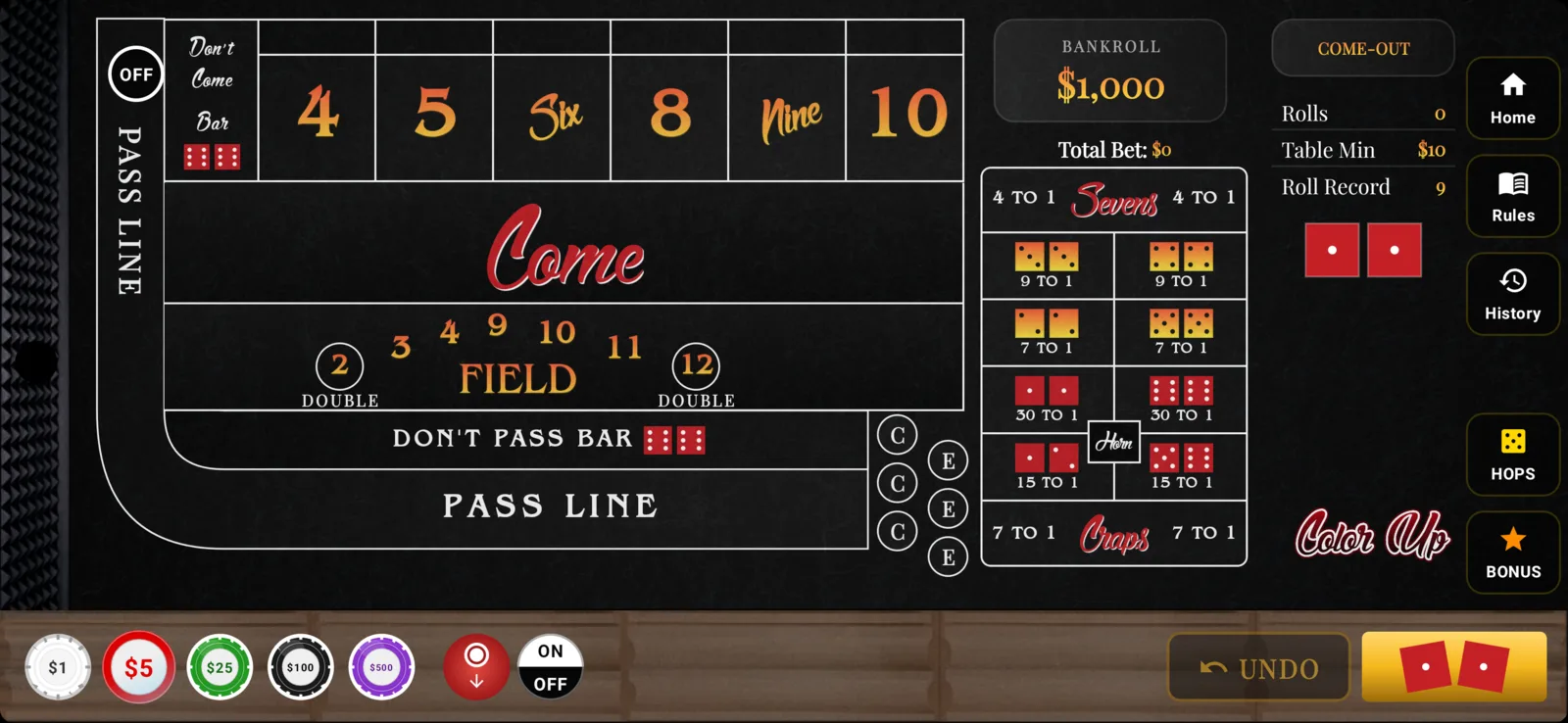 The Press It! Craps table in the Color Up theme, a black felt with orange and red numerals.